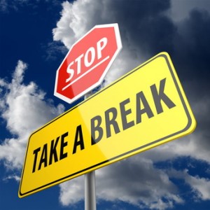 Take a Break words on Road Sign and Stop Sign
